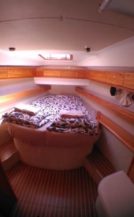 The double bed in the forward cabin