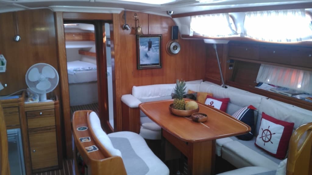 The saloon seen from the galley, with the chart table